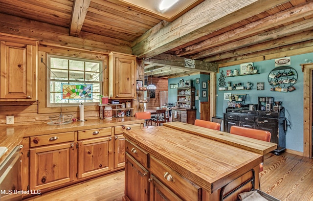 106 Mcwilliams Dr, Terry, MS 39170 - kitchen with wood counters, light wood finished floors, beam ceiling, wooden ceiling, and brown cabinetry