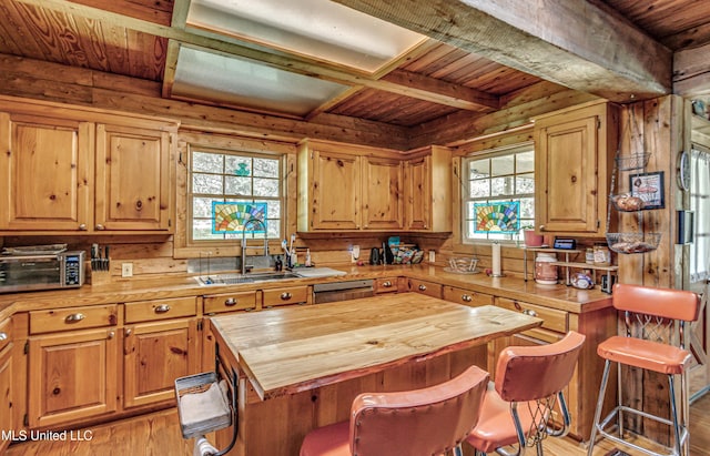 106 Mcwilliams Dr, Terry, MS 39170 - kitchen featuring wood counters, a sink, wood ceiling, light wood-style flooring, and beamed ceiling