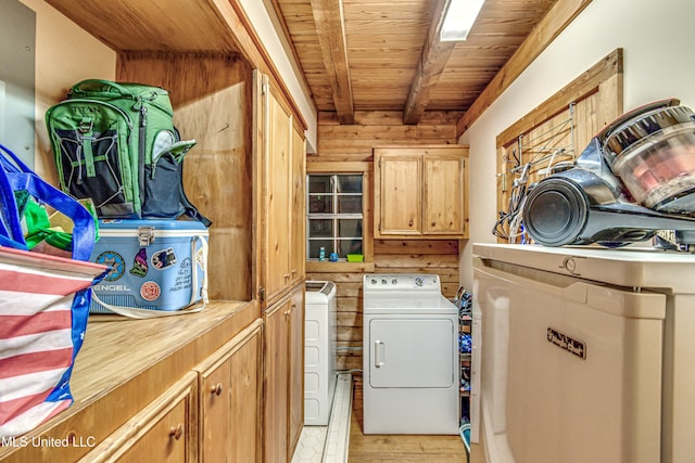 106 Mcwilliams Dr, Terry, MS 39170 - laundry area with cabinet space, wood ceiling, independent washer and dryer, and light wood-style flooring