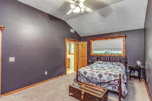 106 Mcwilliams Dr, Terry, MS 39170 - bedroom with carpet, vaulted ceiling, baseboards, ceiling fan, and ensuite bathroom