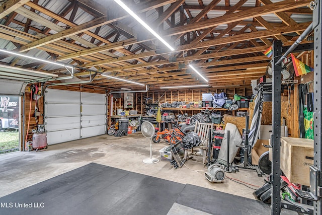 106 Mcwilliams Dr, Terry, MS 39170 - garage with a workshop area