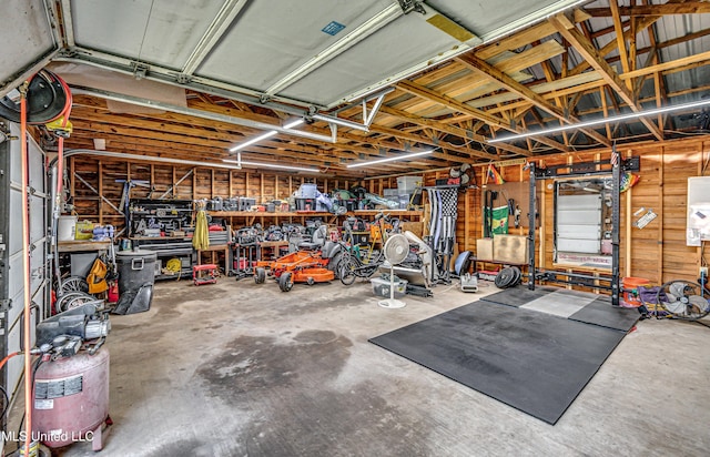106 Mcwilliams Dr, Terry, MS 39170 - garage featuring a workshop area