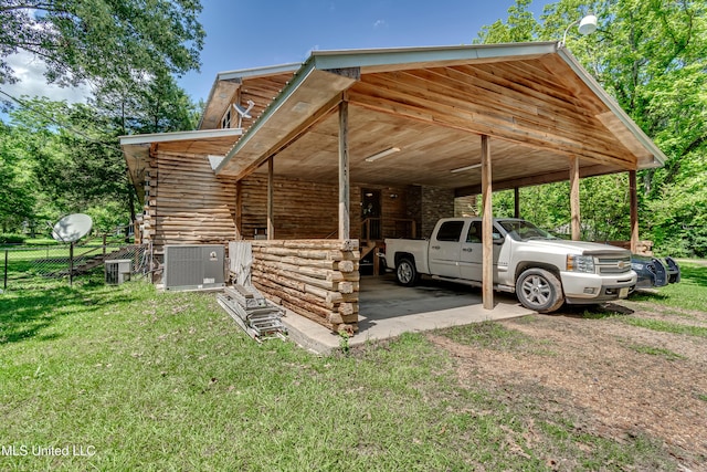 106 Mcwilliams Dr, Terry, MS 39170 - view of parking featuring a carport and dirt driveway