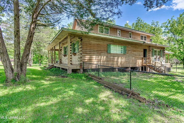 106 Mcwilliams Dr, Terry, MS 39170 - view of front of house featuring log siding and a porch