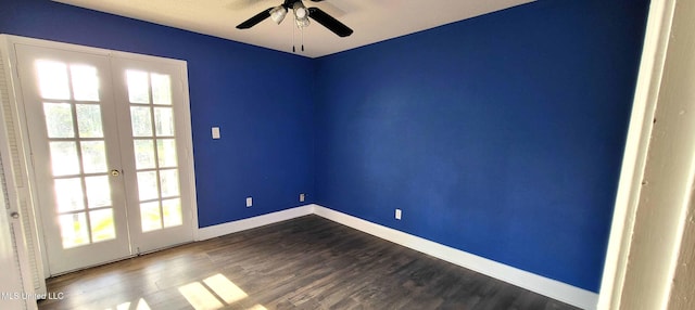 904 E Lakeshore Dr, Carriere, MS 39426 - spare room with french doors, healthy amount of natural light, dark wood finished floors, and a ceiling fan