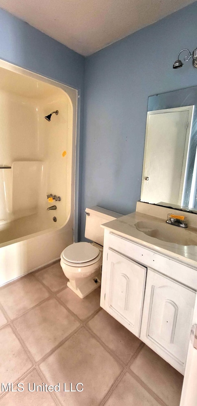904 E Lakeshore Dr, Carriere, MS 39426 - full bathroom featuring vanity, toilet, shower / bath combination, and tile patterned floors