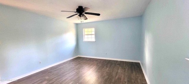 904 E Lakeshore Dr, Carriere, MS 39426 - empty room featuring baseboards, a ceiling fan, and dark wood-style floors