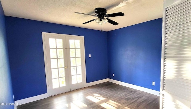 904 E Lakeshore Dr, Carriere, MS 39426 - empty room with french doors, healthy amount of natural light, wood finished floors, ceiling fan, and a textured ceiling