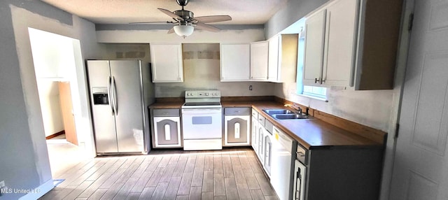 904 E Lakeshore Dr, Carriere, MS 39426 - kitchen with stainless steel fridge, white range with electric cooktop, a sink, ceiling fan, and dishwasher
