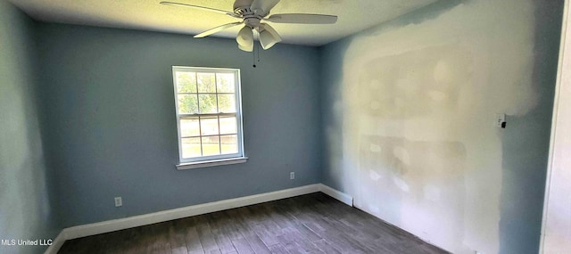 904 E Lakeshore Dr, Carriere, MS 39426 - spare room featuring ceiling fan, dark wood finished floors, and baseboards