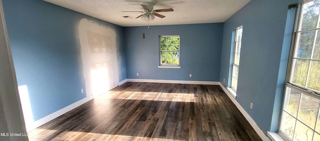 904 E Lakeshore Dr, Carriere, MS 39426 - spare room featuring wood finished floors, ceiling fan, and baseboards