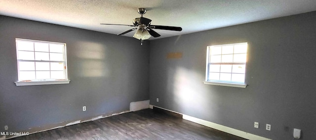 904 E Lakeshore Dr, Carriere, MS 39426 - empty room featuring ceiling fan, dark wood-type flooring, and baseboards