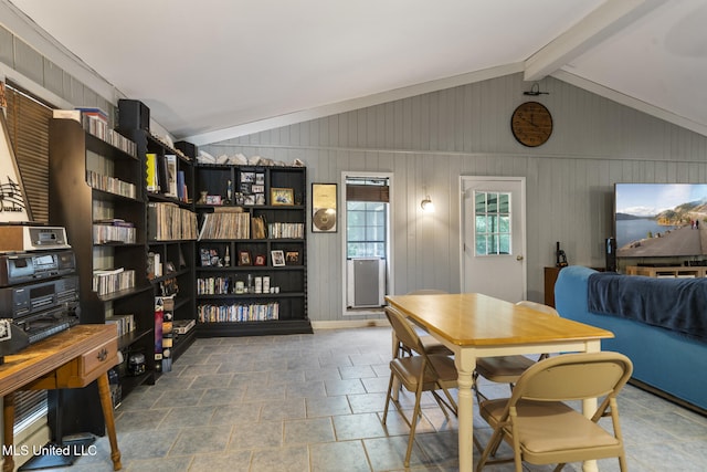 5539 Gates Ave, Long Beach, MS 39560 - dining area with lofted ceiling and stone tile flooring