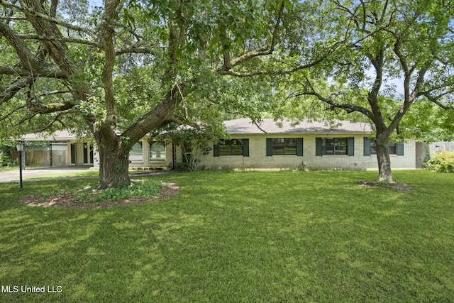 5539 Gates Ave, Long Beach, MS 39560 - single story home with a front lawn and brick siding