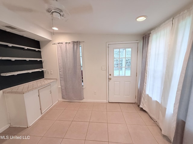 3908 Wildwood Rd, Moss Point, MS 39562 - entrance foyer with light tile patterned floors and recessed lighting