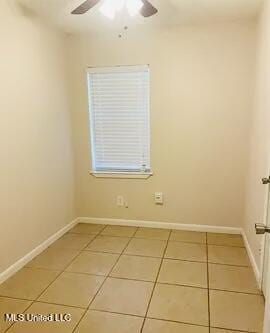 3908 Wildwood Rd, Moss Point, MS 39562 - spare room featuring light tile patterned flooring and ceiling fan
