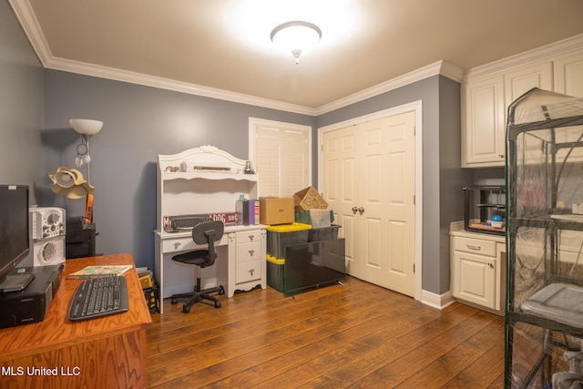 office with crown molding and dark hardwood / wood-style floors