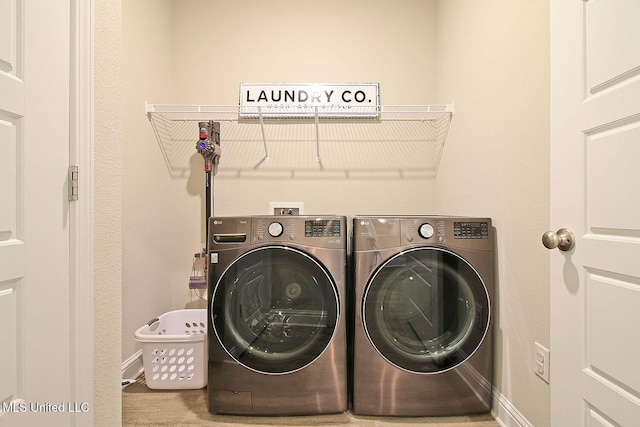 laundry area featuring washer and clothes dryer