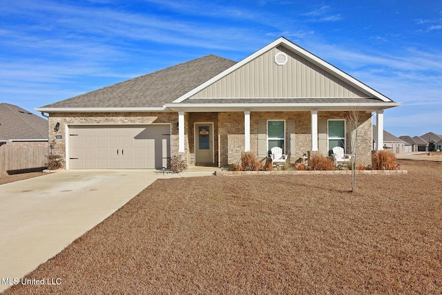 view of front of house featuring a garage and covered porch