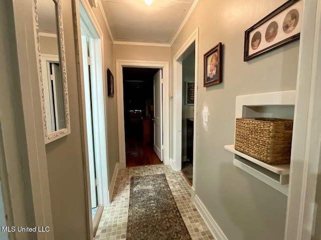 hall featuring tile patterned floors and ornamental molding