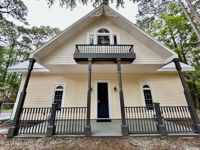 exterior space featuring a balcony
