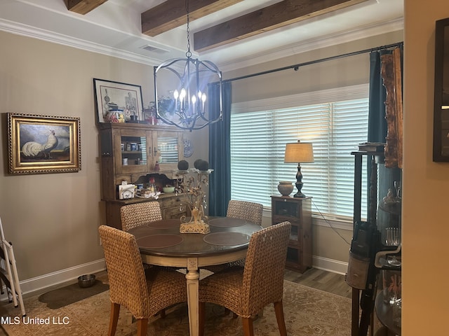 6819 Hawks Vw, Olive Branch, MS 38654 - dining space with baseboards, a chandelier, wood finished floors, beam ceiling, and crown molding