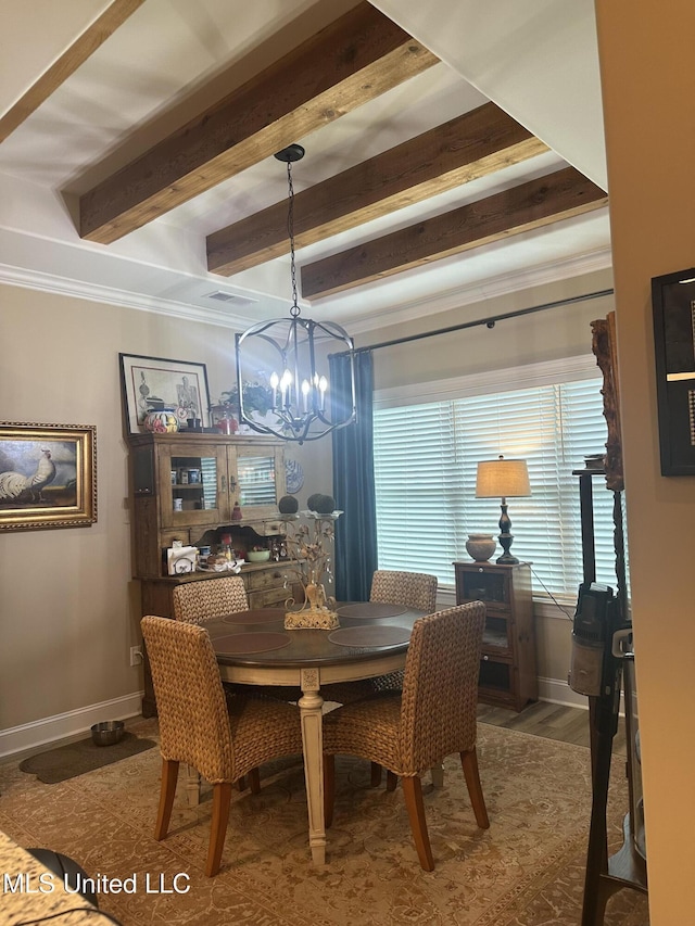 6819 Hawks Vw, Olive Branch, MS 38654 - dining area featuring a chandelier, beamed ceiling, baseboards, ornamental molding, and wood finished floors
