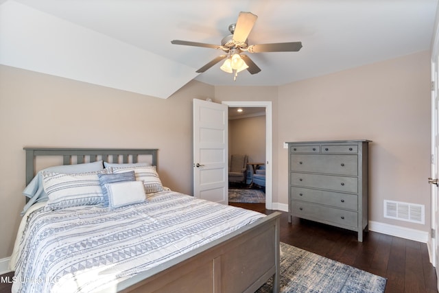 bedroom with visible vents, baseboards, a ceiling fan, and dark wood-style flooring