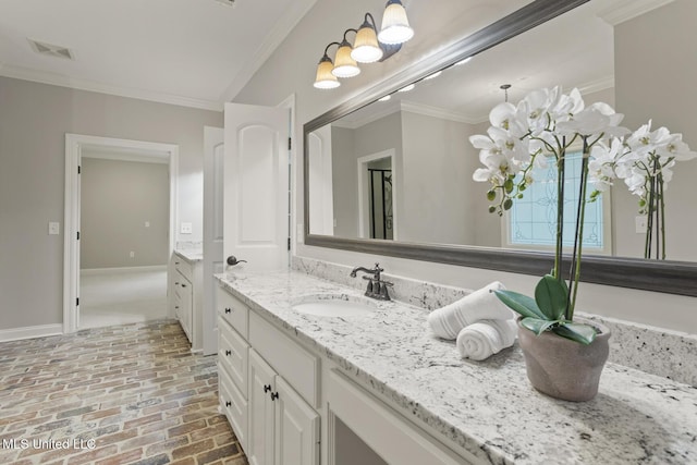 191 N Brandon Blvd, Brandon, MS 39042 - bathroom featuring brick floors, vanity, and ornamental molding