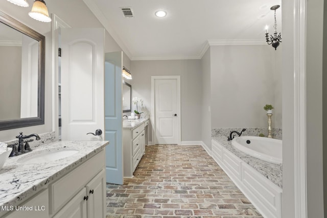 191 N Brandon Blvd, Brandon, MS 39042 - bathroom with brick flooring, two vanities, a bath, crown molding, and recessed lighting