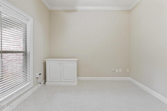 191 N Brandon Blvd, Brandon, MS 39042 - empty room featuring crown molding, healthy amount of natural light, and light carpet
