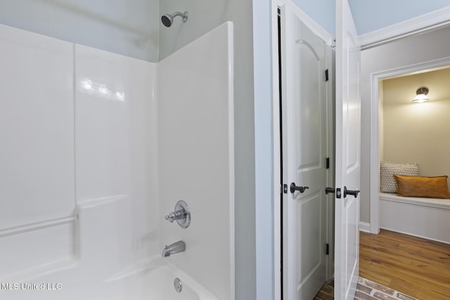 191 N Brandon Blvd, Brandon, MS 39042 - bathroom featuring shower / bath combination and wood finished floors