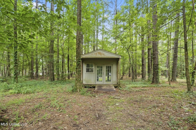 191 N Brandon Blvd, Brandon, MS 39042 - view of outbuilding featuring french doors and a forest view