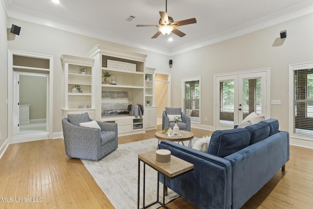 191 N Brandon Blvd, Brandon, MS 39042 - living room featuring french doors, light wood finished floors, crown molding, ceiling fan, and recessed lighting