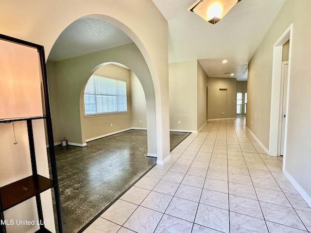 6901 N Rue Mornay, Biloxi, MS 39532 - hallway featuring healthy amount of natural light and arched walkways