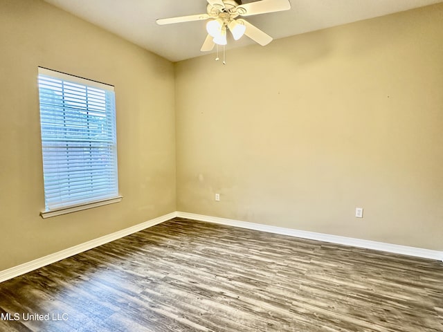 6901 N Rue Mornay, Biloxi, MS 39532 - spare room with wood finished floors and a ceiling fan