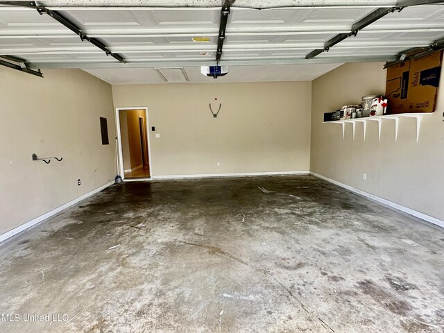 6901 N Rue Mornay, Biloxi, MS 39532 - garage featuring a garage door opener and electric panel