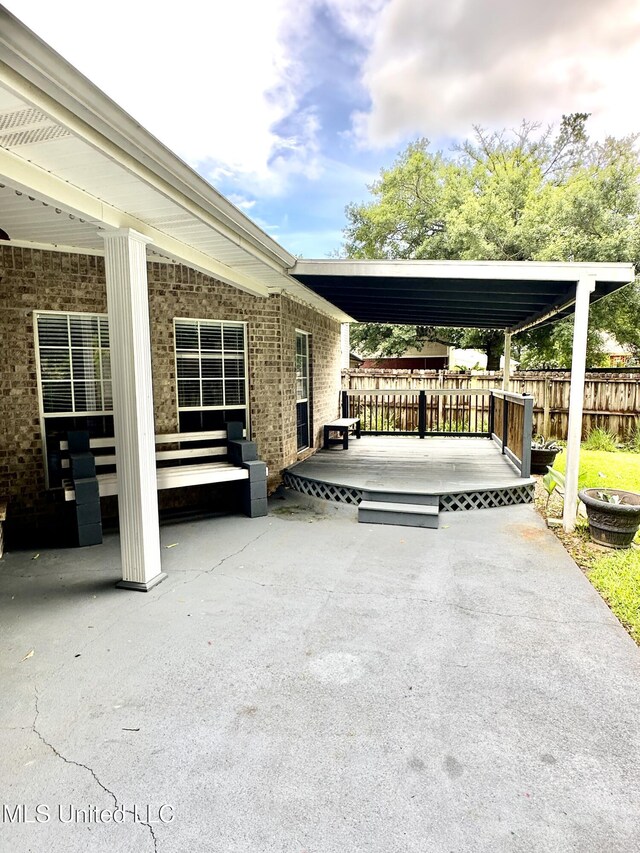 6901 N Rue Mornay, Biloxi, MS 39532 - view of patio featuring a wooden deck
