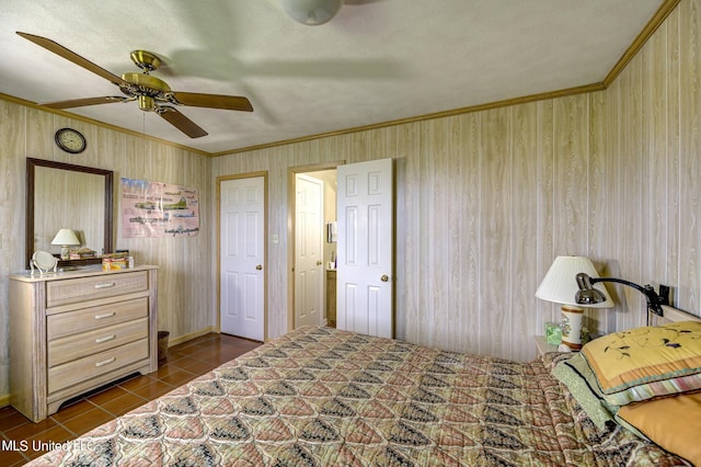 121 Belle Island Dr, Vicksburg, MS 39183 - bedroom featuring dark tile patterned flooring, a ceiling fan, and ornamental molding
