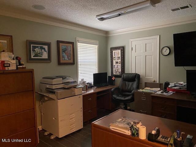 home office featuring ornamental molding, a textured ceiling, and dark hardwood / wood-style flooring