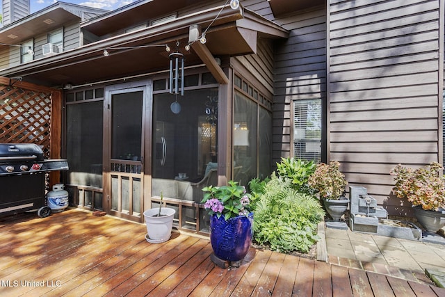 821 Planters Point Dr, Canton, MS 39046 - wooden terrace featuring grilling area and a sunroom