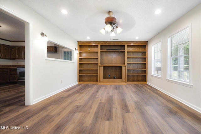 2185 Plum Point Rd, Southaven, MS 38672 - unfurnished living room with a ceiling fan, baseboards, recessed lighting, and wood finished floors