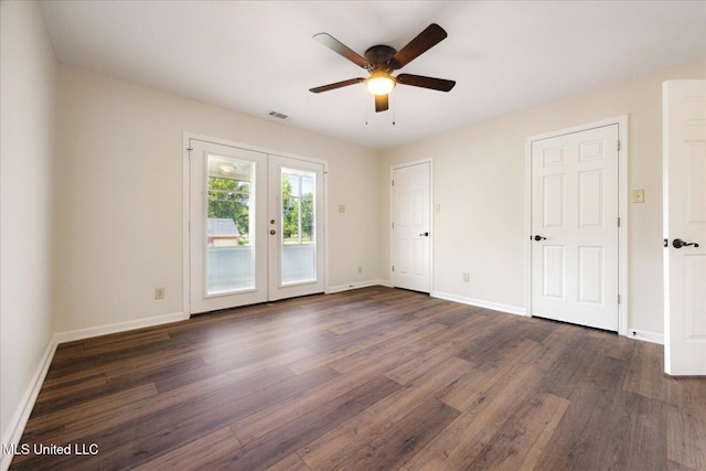 2185 Plum Point Rd, Southaven, MS 38672 - unfurnished bedroom featuring access to exterior, dark wood finished floors, french doors, and baseboards