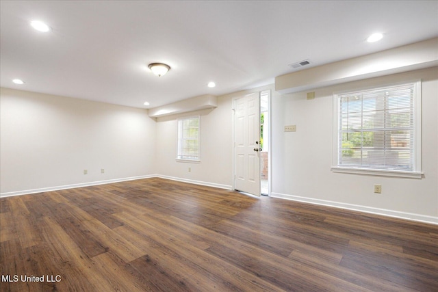 2185 Plum Point Rd, Southaven, MS 38672 - spare room featuring baseboards, dark wood-style floors, and recessed lighting