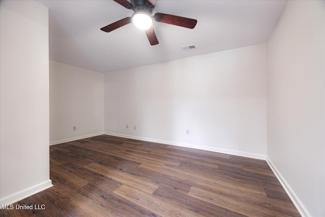 2185 Plum Point Rd, Southaven, MS 38672 - empty room with a ceiling fan, dark wood finished floors, and baseboards