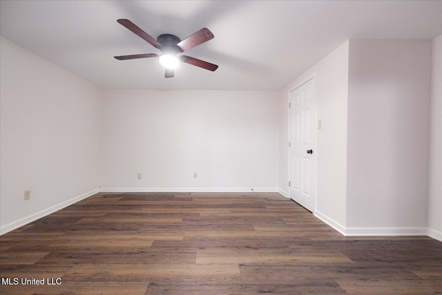 2185 Plum Point Rd, Southaven, MS 38672 - spare room featuring a ceiling fan, baseboards, and dark wood-type flooring