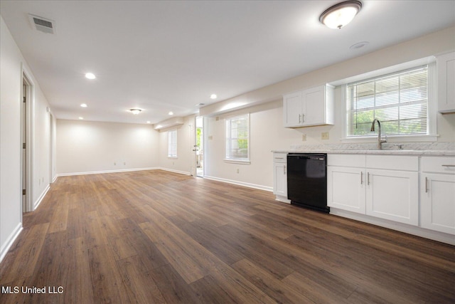 2185 Plum Point Rd, Southaven, MS 38672 - kitchen featuring black dishwasher, a sink, dark wood-type flooring, white cabinetry, and recessed lighting