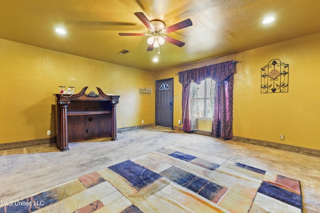 foyer with ceiling fan