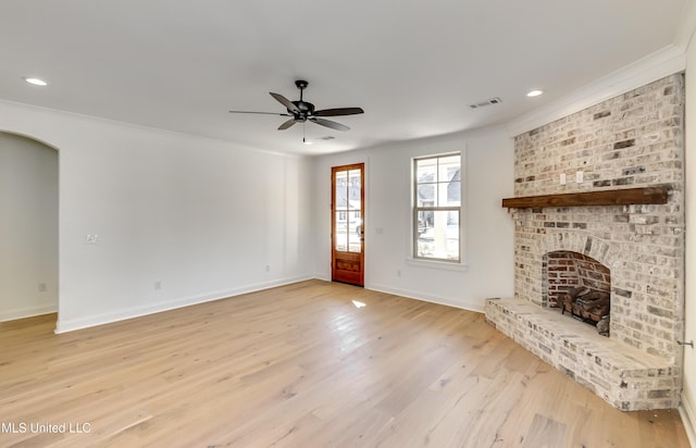 614 Cobalt Way, Brandon, MS 39042 - unfurnished living room with light hardwood / wood-style flooring, a fireplace, ornamental molding, and ceiling fan
