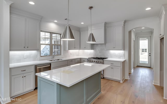 614 Cobalt Way, Brandon, MS 39042 - kitchen with sink, tasteful backsplash, range, a center island, and stainless steel dishwasher